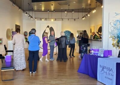 Guests celebrating at the A Walk Down Rushville book launch in La Jolla, April 2024