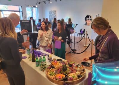 Guests celebrating at the A Walk Down Rushville book launch in La Jolla, April 2024