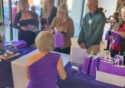 Guests celebrating at the A Walk Down Rushville book launch in La Jolla, April 2024