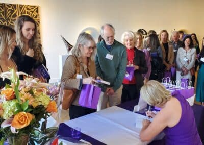 Guests celebrating at the A Walk Down Rushville book launch in La Jolla, April 2024