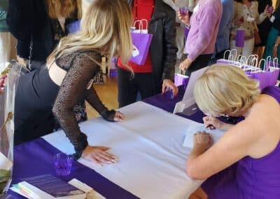 Guests celebrating at the A Walk Down Rushville book launch in La Jolla, April 2024