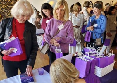 Guests celebrating at the A Walk Down Rushville book launch in La Jolla, April 2024