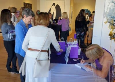 Guests celebrating at the A Walk Down Rushville book launch in La Jolla, April 2024