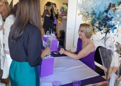 Guests celebrating at the A Walk Down Rushville book launch in La Jolla, April 2024
