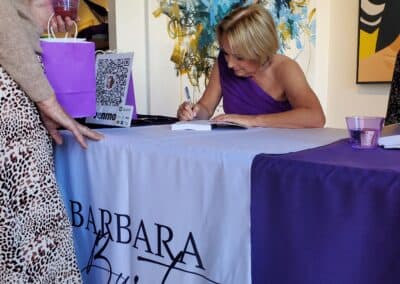 Guests celebrating at the A Walk Down Rushville book launch in La Jolla, April 2024